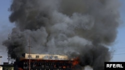 A shopping center burns in central Kabul on January 18.