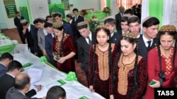 Voting at a polling station in Ashgabat