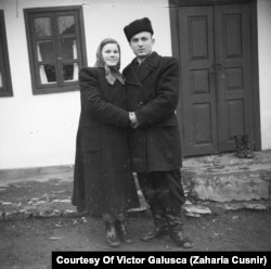 Sergiu Cebotari (right) with his wife, Ioana -- the photographer’s daughter -- in front of the Cusnir house