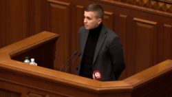 Mykhaylo Tkach speaks before Ukraine's parliament in November 2019.