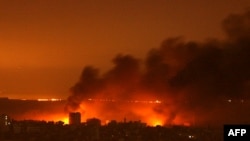 Smoke billows from fires raging on the edge of Gaza City on January 5.