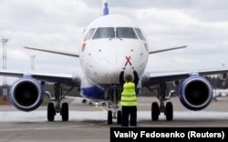 A Belavia passenger jet lands at Minsk airport in 2019.