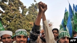 Pakistani students march as they shout anti-Indian slogans in Lahore.