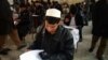 Recent graduates take university entrance exams in Kabul in 2011.