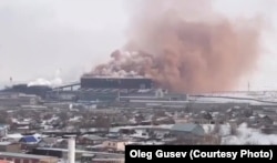 A pink cloud of smoke shrouds the ArcelorMittal plant in Temirtau in February 2021.