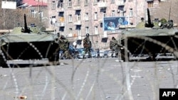 Armored vehicles patrol the streets of the Armenian capital, Yerevan, in the wake of the February 2008 presidential election.