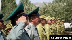 Tajik guards stand at attention during the official opening of a new Tajik-Afghan border post, which has been funded by the U.S. State Department. (courtesy of the Bureau of International Narcotics and Law Enforcement Affairs - U.S. State Dept.)