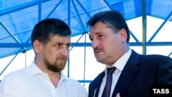 Then-Chechen President Alu Alkhanov (right) with Ramzan Kadyrov in 2006