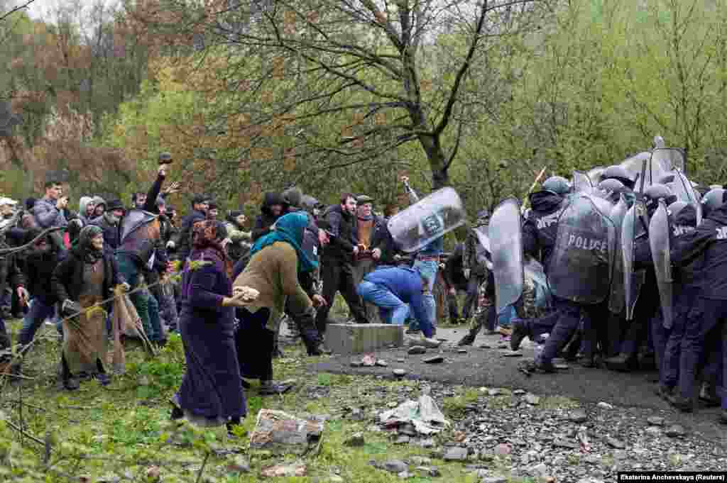 In April, violent clashes broke out (pictured) between police and locals angry at the planned construction of a dam in the gorge. After locals rained rocks down on riot police, the authorities responded with tear gas and rubber bullets.