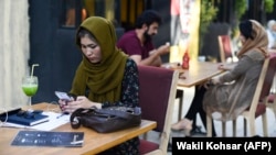 Young people in the Afghan capital, Kabul, are worried that they could lose their freedoms -- like dining out, socializing, and dressing how they like -- if the Taliban returns to power.