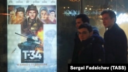 People wait in line to see T-34 at the Formula Kino movie theater in Moscow on January 5.