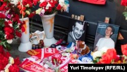 A makeshift memorial to football fan Yury Volkov, who was killed in a July 2010 street brawl.