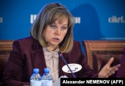 The head of Russia's Central Election Commission, Ella Pamfilova, talks to reporters on March 19.