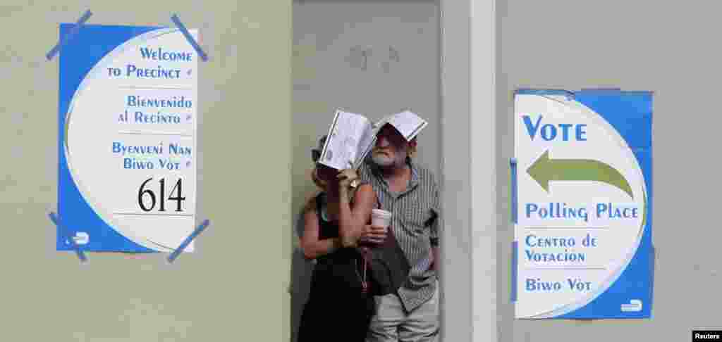 People wait in line to vote in Coral Gables, Florida.