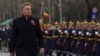 Romanian President Klaus Iohannis attends a military parade in Bucharest in December. 