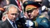 Russian President Vladimir Putin (left) and Defense Minister Sergei Shoigu attend a Moscow parade marking victory in World War II in June 2020.