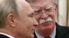 Russian President Vladimir Putin (left) with U.S. National Security Adviser John Bolton in Moscow earlier this week.