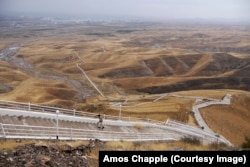 A rare user of the “walk of health” that runs some 37 kilometers through the mountains around Ashgabat.