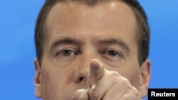 President Dmitry Medvedev gestures during a press conference at the Skolokovo innovation center outside Moscow on May 18.