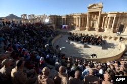 Russian conductor Valery Gergiyev leads a concert in the amphitheater of the ancient city of Palmyra on May 5.