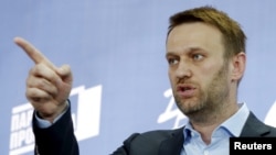 Russian opposition leader Aleksei Navalny speaks during a news conference in Moscow on April 22.