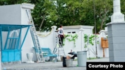 A film crew member works on a set for "The Way Of The Leader" Temirtau on August 22.