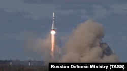 A Soyuz-2 1b rocket booster carrying a Russian Kosmos-2546 military satellite is launched from the Plesetsk Cosmodrome on May 22.