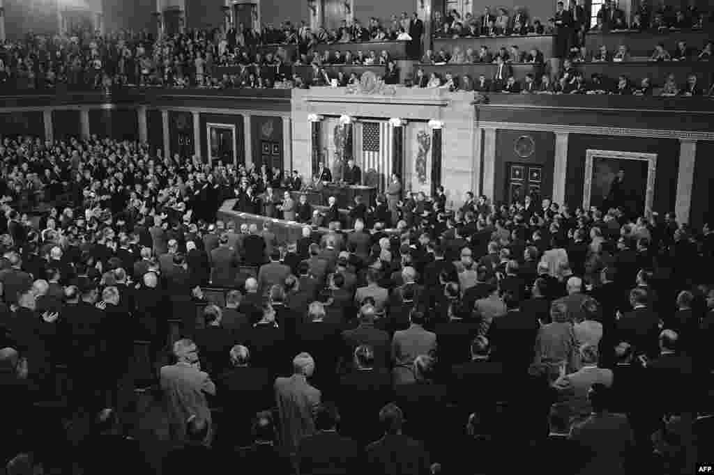 President Kennedy gives a speech to the U.S. Congress on May 26, 1961, asking that lawmakers allocate the money to send the first man to the moon before 1970.