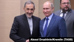 Ali Akbar Velayati (left), a senior adviser to Iran's supreme leader, meets Russia's President Vladimir Putin in Moscow on July 12. 