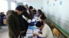 Uzbeks vote in last month's parliamentary elections. Are the turnout figures finally close to accurate?