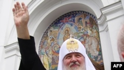 Orthodox Patriarch of Moscow and All Russia Kirill waves to Ukrainians in Odesa on July 20.