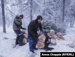 Boleslav Vavilov collects firewood -- the only source of heating in the monastery.