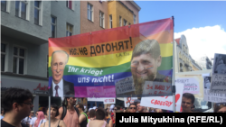 Russian authorities have long turned a blind eye to human rights abuses in the North Caucasus, where Chechen leader Ramzan Kadyrov (on banner, right) is frequently accused of overseeing massive human rights abuses including the persecution of LGBT people.