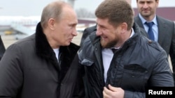 Vladimir Putin pictured with Ramzan Kadyrov in 2011.