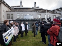 People demonstrate outside the International Criminal Tribunal for the former Yugoslavia in The Hague in March 2010.