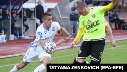 Players in action during the Belarusian Premier League soccer match between FC Dynamo-Brest and FC Shakhter Soligorsk in Brest on April 25