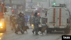 Canine units with security forces after the December 30 bomb tore through a trolleybus near a downtown market in Volgograd.