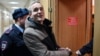 More Jehovah's Witnesses Detained In Russia After Adherent's Conviction