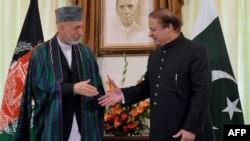 Afghan President Hamid Karzai (left) with Pakistani Prime Minister Nawaz Sharif at the Prime Ministers House in Islamabad in late August.