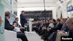 Ukrainian President Viktor Yanukovych delivers a speech during the ninth Yalta Annual Meeting "Ukraine and the World: Addressing Tomorrow's Challenges Together" in the Black Sea resort of Yalta on September 14.