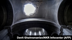 A photo shows the internal destructions of the Cathedral of Kazanchetsots in the breakaway Nagorno-Karabakh region's town of Shushi on October 8, 2020