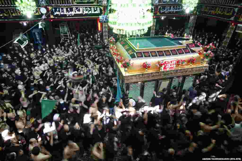 Crowds packed in the Kerbala mosque in Tehran.&nbsp;Iranian President Hassan Rohani was under pressure from hard-liners who opposed any limits on religious ceremonies or the closing of shrines due to the pandemic.