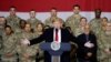 U.S. President Donald Trump delivers remarks to U.S. troops during an unannounced visit to Bagram Air Base near Kabul on November 28, 2019.