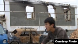 A burned down house in Tashlak, a village outside Osh.