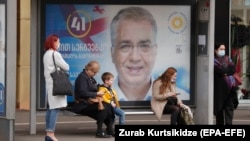 An election poster for progovernment candidate David Sergienko in Tbilisi on October 20.