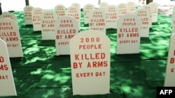 A mock graveyard is erected opposite the United Nations in New York last year to protest against the fact that many are killed by arms everyday around the world. (file photo)