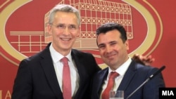 NATO Secretary-General Jens Stoltenberg (left) meets with Macedonian Prime Minister Zoran Zaev in Skopje on January 18. 