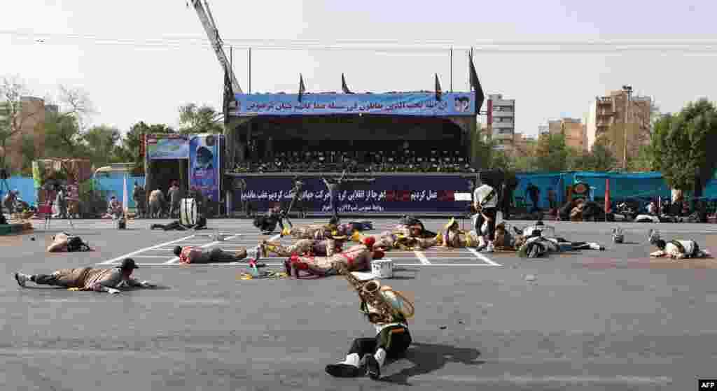 Soldiers take cover at the scene of the attack