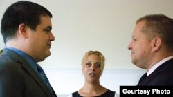 Shawn Gaylord (left) and Vyachaslau Bortnik taking their wedding vows in Washington, D.C. on July 11.