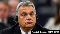 Hungarian Prime Minister Viktor Orban listens to a speech in the plenary session at the European Parliament in Strasbourg on September 11.